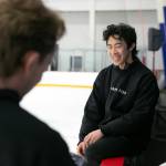 Jean-Luc Baker, left, and Nathan Chen chat between teaching lessons during the Seattle Skating Club 2024 Your True Step figure skating seminar on Saturday, June 15, 2024, at Olympic View Arena in Mountlake Terrace, Washington. (Ryan Berry / The Herald)