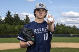 Glacier Peak’s Karsten Sweum (10) poses for a portrait as The Herald's All-Area Baseball Player of the Year at Glacier Peak High School on Tuesday, June 18, 2024 in Snohomish, Washington. (Annie Barker / The Herald)