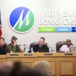 School board members listen to public comment during a Marysville School Board meeting on Monday, June 3, 2024 in Marysville, Washington. Rinehardt is seated third from left. (Olivia Vanni / The Herald)