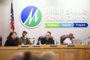 School board members listen to public comment during a Marysville School Board meeting on Monday, June 3, 2024 in Marysville, Washington. (Olivia Vanni / The Herald)