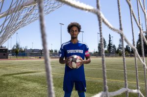 Shorewood senior Isaak Abraham poses for a portrait as The Herald's Boys Soccer Player of the Year at Shorewood High School on Wednesday, June 19, 2024 in Shoreline, Washington. (Annie Barker / The Herald)