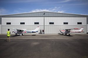 Red-Tailed Hawks Flying Club members prepare to taxi onto the runway at Arlington Municipal Airport on June 12, 2021, in Arlington, Washington. (Olivia Vanni / The Herald)