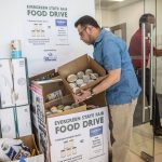 Robert Fabia, a sales manger at Lee Johnson Hyundai of Everett, shows some of the donations they have received on Tuesday, June 25, 2024 in Everett, Washington. (Olivia Vanni / The Herald)