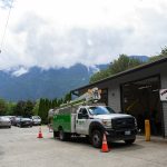 A Ziply Fiber truck is parked outside Darrington Fire District Station 38 during a press conference and groundbreaking for the SR 530 Broadband Project on Wednesday, June 26, 2024, outside Darrington, Washington. (Ryan Berry / The Herald)