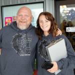 Ideal Option peer support counselors Bradley Walser and Casey Gibson stop for a quick photo before heading out to transport a person to detox following a community conversation about opioid use disorder on Thursday, June 27, 2024, at the St. Vincent DePaul Resource Center in Monroe, Washington. Walter and Gibson are part of a pilot program that aims to give transportation to those seeking treatment for addiction. (Ryan Berry / The Herald)