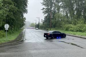 Police block a road while responding to a fatal shooting in Lake Stevens May 24, 2021. (Photo provided by Dakota Bair)