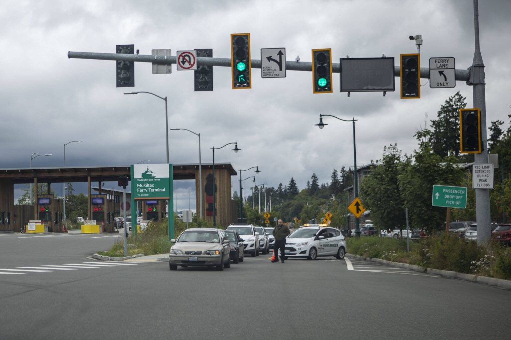 Law enforcement block off the road where a person was hit by a train near the Port of Everett Mount Baker Terminal on Thursday, June 27, 2024 in Mukilteo, Washington. (Annie Barker / The Herald)