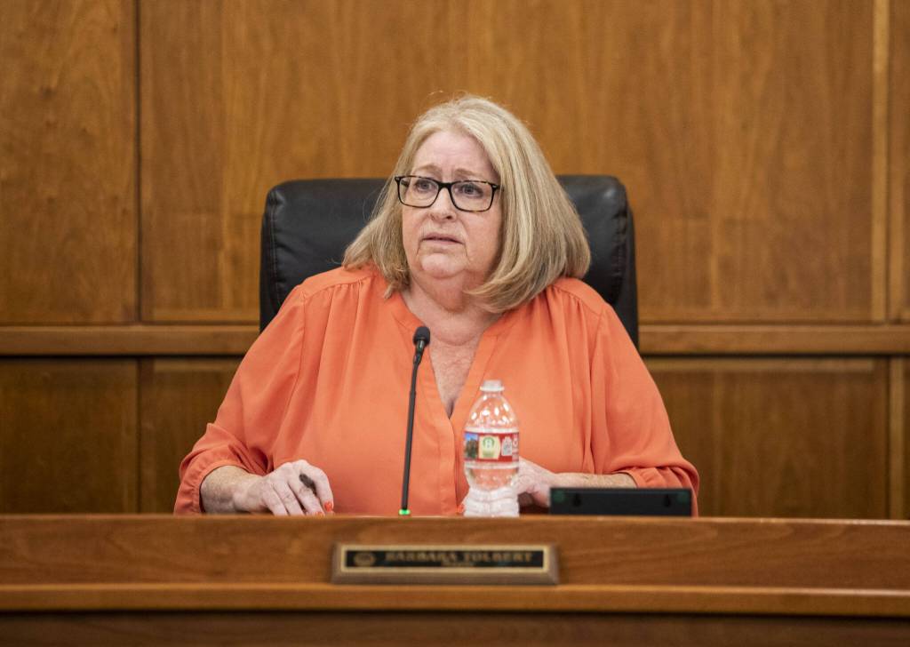 Arlington Mayor Barbara Tolbert listens to public comment about Arlington Pride during a city council meeting on Monday, July 3, 2023, in Arlington, Washington. (Olivia Vanni / The Herald)
