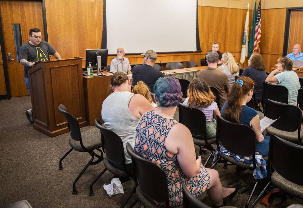 Brian Pollack speaks in support of Arlington Pride during an Arlington City Council meeting on Monday, July 3, 2023, in Arlington, Washington. (Olivia Vanni / The Herald)
