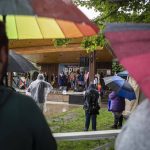 People watch the main stage during the third annual Arlington Pride event in Arlington, Washington on Sunday, June 2, 2024. (Annie Barker / The Herald)