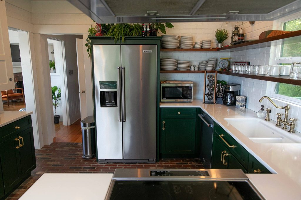 A modern kitchen is available at Ferry Cove on May 29, 2024, in Clinton. (Ryan Berry / The Herald)