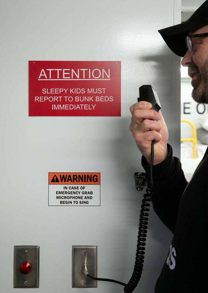 Ryan Anderson makes an announcement over the functioning intercom at Ferry Cove on May 29, 2024, in Clinton. (Ryan Berry / The Herald)