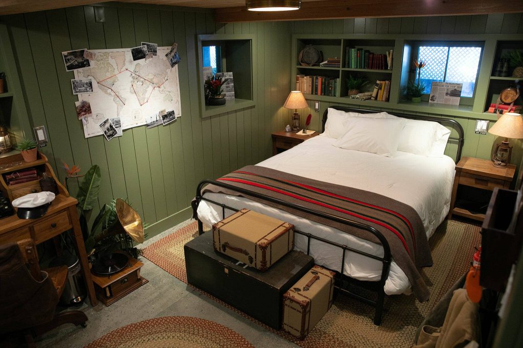 A basement bedroom at Ferry Cove is themed like an old-timey jungle cruise on May 29, 2024, in Clinton. (Ryan Berry / The Herald)