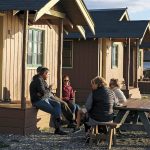 Guests enjoy the sunset and wind Friday afternoon at Cama Beach Historical State Park on Camano Island on October 25, 2019. (Kevin Clark / The Herald)