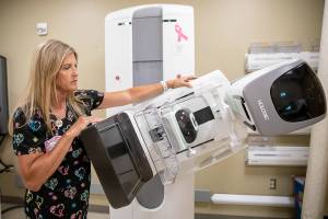 Lead Mammography Technologist Starla DeLap talks about the different ways the Hologic 3D Mammography Exam can be situated around a patient on Wednesday, July 10, 2024 in Everett, Washington. (Olivia Vanni / The Herald)