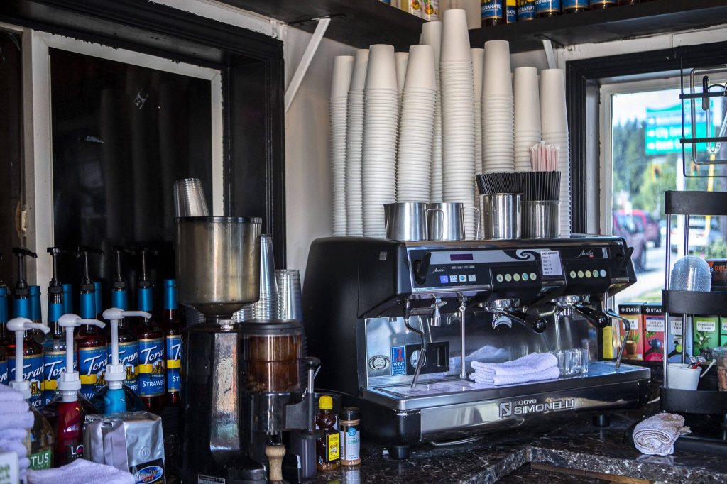 Syrups and machines sit inside Rubys Espresso in Everett, Washington on Tuesday, July 2, 2024. (Annie Barker / The Herald)