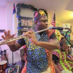 Etienne Cakpo, director of Seattle-based Gansango Dance & Music company, performs during the annual Bideww Arts Exhibition and Talent Show hosted by Washington West African Center on Dec. 30, 2022, at Neema Community Church in Everett. Gansango Dance & Music company is set to perform during the second-annual Sounds of Africa Festival on Aug. 17 in Everett. (Ousman Jarju / Washington West Africa Center)