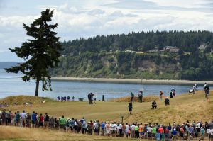 The group of Jordan Spieth, Jason Day and Justin Rose on the third green in the second round of the 2015 U.S. Open golf tournament at Chambers Bay in University Place, Wash., on Friday, June 19, 2015. Spieth finished 5 under par for the tournament, making him the sixth player in history to claim both the Masters and U.S. Open titles the same year. (John David Mercer / Tribune News Service)
