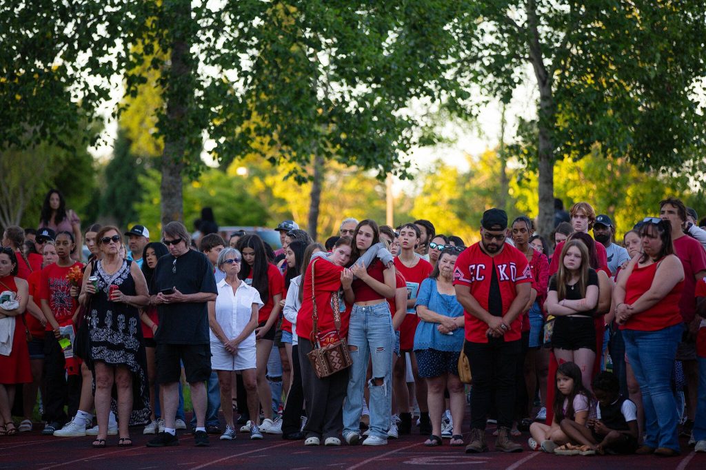 Community members gather to mourn during a vigil held in memory of Jayda Woods-Johnson at Mountlake Terrace High School on Sunday, July 7, 2024, in Mountlake Terrace, Washington. (Ryan Berry / The Herald)