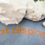 The words "not disposable" are printed on the ground next to the Styrofoam recycling area on Wednesday, Jan. 29, 2020 in Bothell, Wash. (Olivia Vanni / The Herald)