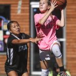 We Fired The Dads and the Alphas compete in the 12-13 year old female bracket during the Everett 3on3 tournament in downtown Everett, Washington on Sunday, July 14, 2024. (Annie Barker / The Herald)