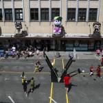 Players warm up and play games during the Everett 3on3 tournament in downtown Everett, Washington on Sunday, July 14, 2024. (Annie Barker / The Herald)