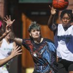 The Bucket Getters and Lockdown face off in the over 18 year old female league during the Everett 3on3 tournament in downtown Everett, Washington on Sunday, July 14, 2024. (Annie Barker / The Herald)