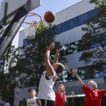 MaMbA OUT and the Basket Brawlers face off in the 8-9 year old male league during the Everett 3on3 tournament in downtown Everett, Washington on Sunday, July 14, 2024. (Annie Barker / The Herald)