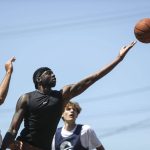 FAB and WeAreEverett face off in the 18 and older mens bracket during the Everett 3on3 tournament in downtown Everett, Washington on Sunday, July 14, 2024. (Annie Barker / The Herald)