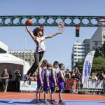 Tyler Cronk performs in the slam dunk competition during the Everett 3on3 tournament in downtown Everett, Washington on Sunday, July 14, 2024. (Annie Barker / The Herald)