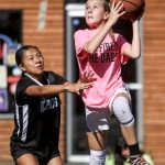 We Fired The Dads and the Alphas compete in the 12-13 year old female bracket during the Everett 3on3 tournament in downtown Everett, Washington on Sunday, July 14, 2024. (Annie Barker / The Herald)