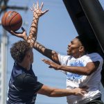 FAB and WeAreEverett face off in the 18 and older mens bracket during the Everett 3on3 tournament in downtown Everett, Washington on Sunday, July 14, 2024. (Annie Barker / The Herald)