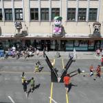 Players warm up and play games during the Everett 3on3 tournament in downtown Everett, Washington on Sunday, July 14, 2024. (Annie Barker / The Herald)