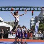 Tyler Cronk performs in the slam dunk competition during the Everett 3on3 tournament in downtown Everett, Washington on Sunday, July 14, 2024. (Annie Barker / The Herald)