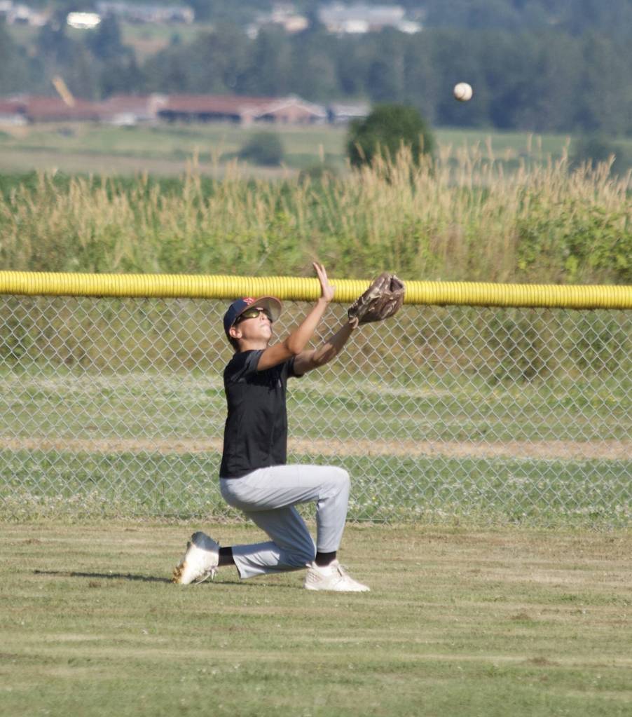 Abel Ellis prepares to catch the ball during practice at the Snohomish Little League Complex in Snohomish, Washington on Thursday, July 18, 2024. (Taras McCurdie / The Herald)