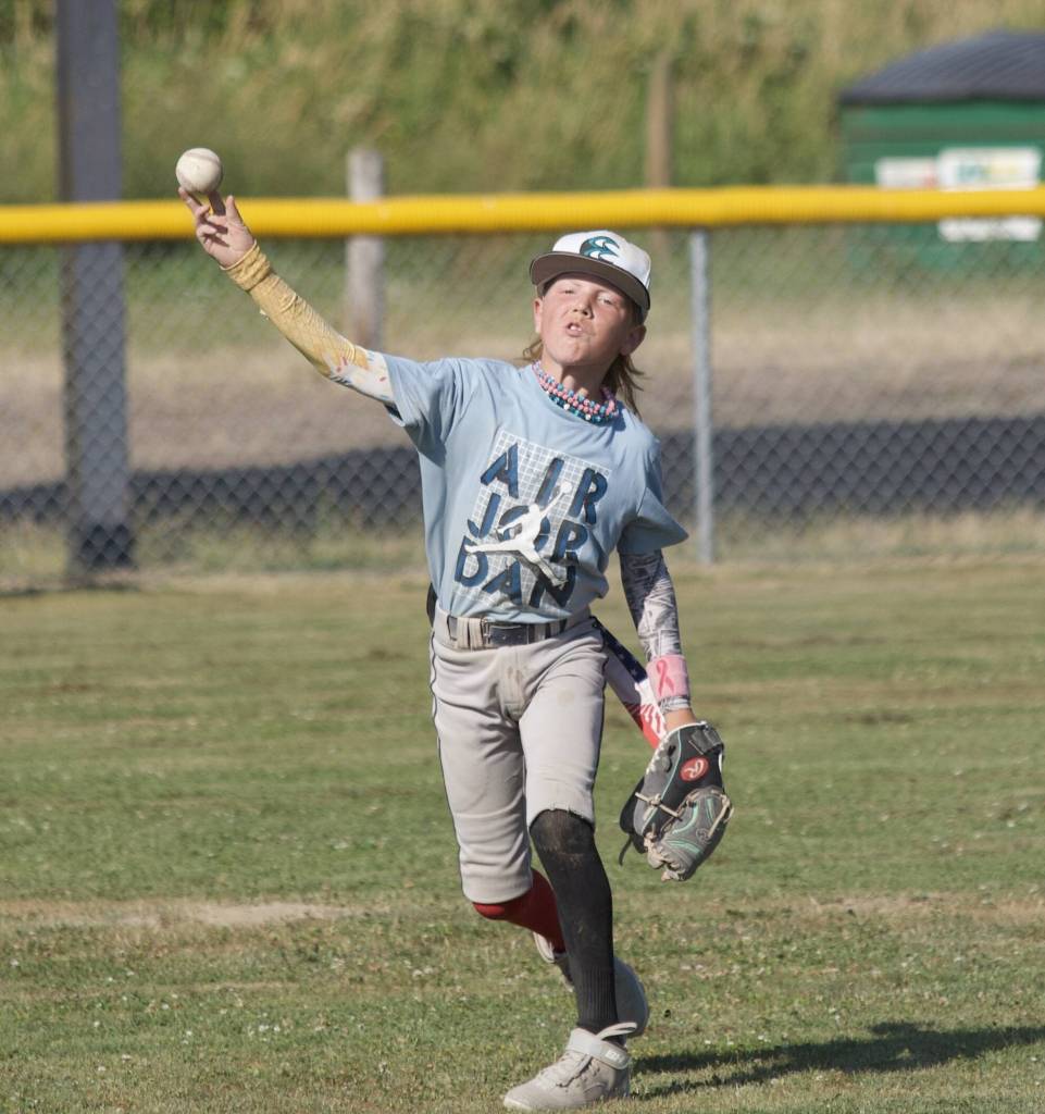 Knox Barstad throws the ball during practice at the Snohomish Little League Complex in Snohomish, Washington on Thursday, July 18, 2024. (Taras McCurdie / The Herald)
