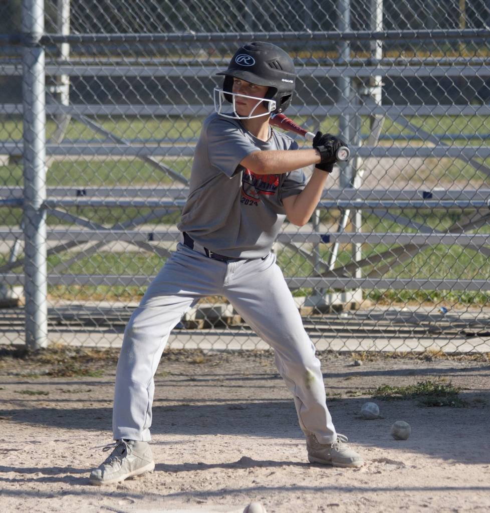 Leo Giovannetti prepares to swing for the ball during practice at the Snohomish Little League Complex in Snohomish, Washington on Thursday, July 18, 2024. (Taras McCurdie / The Herald)
