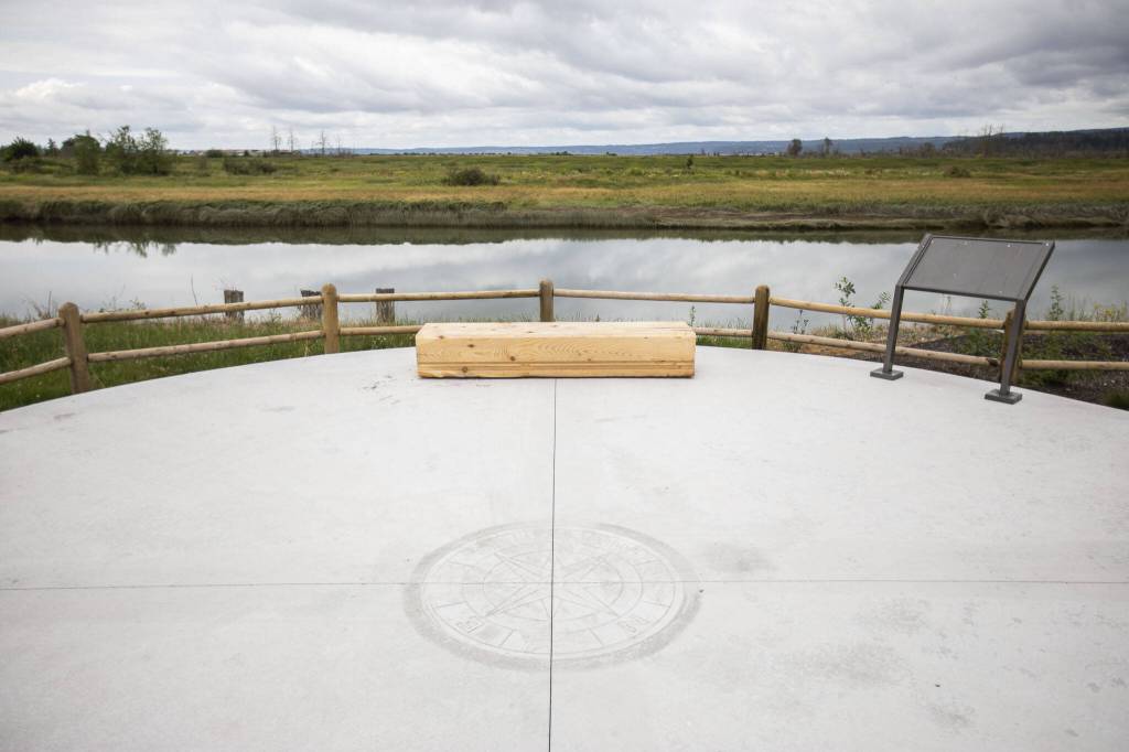 A bench looks out over the Stillaguamish River on Thursday, July 25, 2024 in Stanwood, Washington. (Olivia Vanni / The Herald)