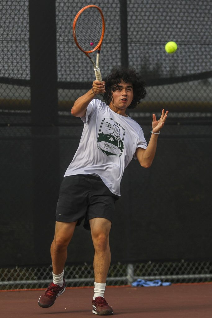 Edmonds-Woodways Nalu Akiona hits the ball during the boys doubles championship match at Snohomish Summer Smash at Snohomish High School in Snohomish, Washington on Sunday, July 21, 2024. (Annie Barker / The Herald)