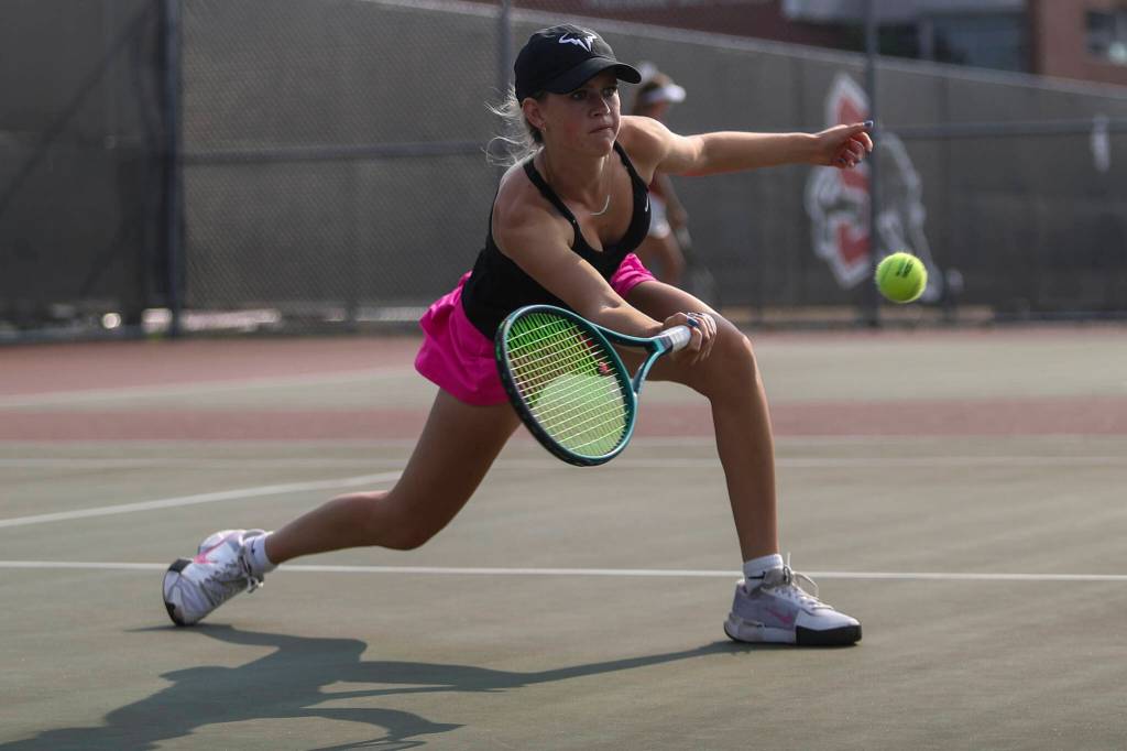 Snohomishs Mak Dauer hits the ball during the girls gold doubles championship match during the Snohomish Summer Smash at Snohomish High School in Snohomish, Washington on Sunday, July 21, 2024. (Annie Barker / The Herald)