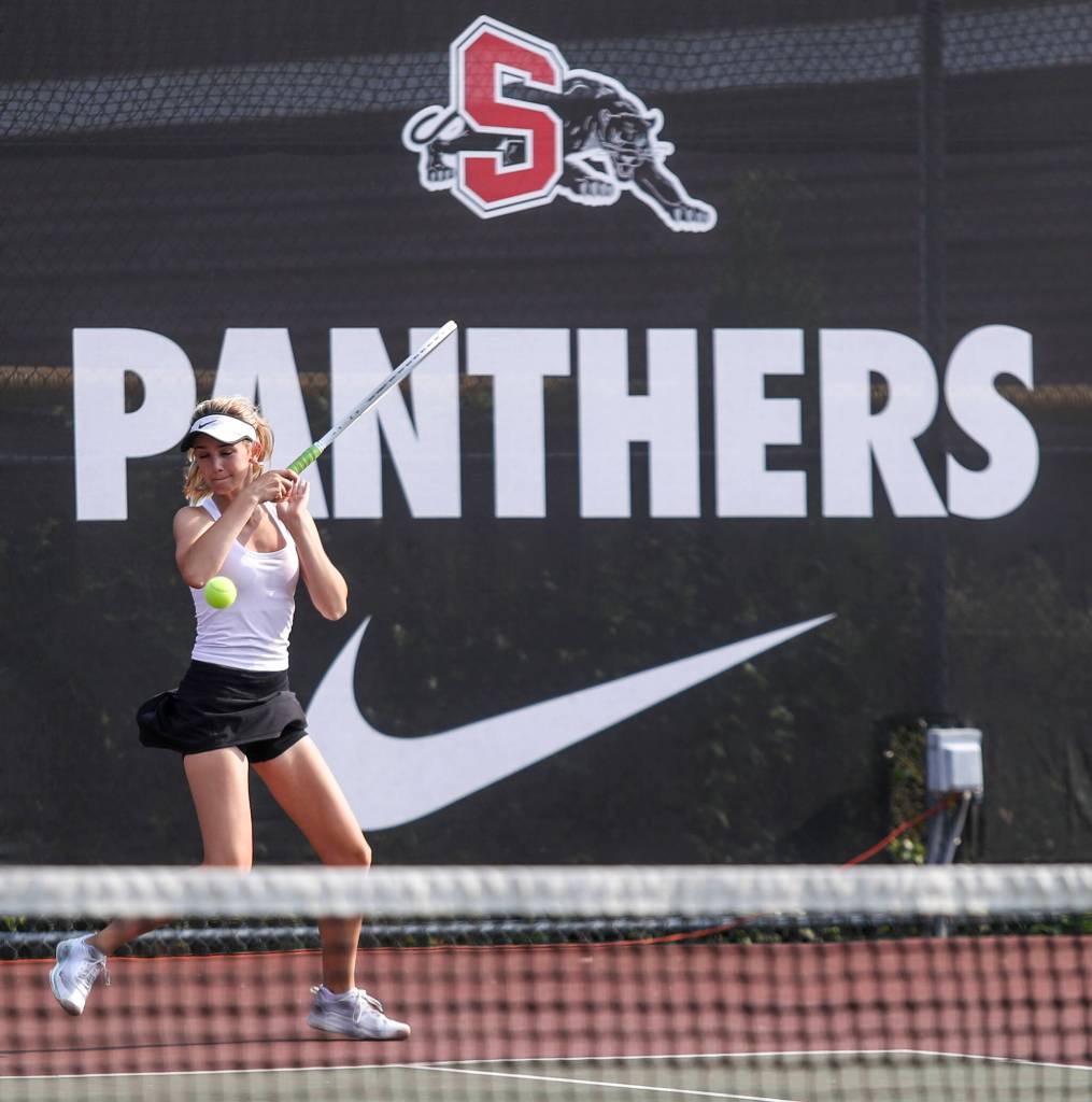 Lakesides Cate Lilleness hits the ball during the girls gold doubles championship match at the Snohomish Summer Smash at Snohomish High School in Snohomish, Washington on Sunday, July 21, 2024. (Annie Barker / The Herald)
