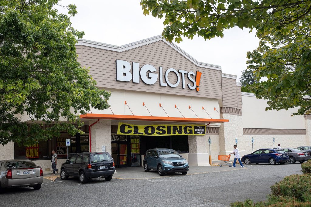 A closing sign hangs above the entrance of the Big Lots at Evergreen and Madison on Monday, July 22, 2024, in Everett, Washington. (Ryan Berry / The Herald)