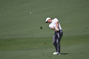 Rory McIlroy hits from the fairway on second hole at the 2024 Masters Tournament at Augusta National Golf Club, Thursday, April 11, 2024, in Augusta, Ga. (Hyosub Shin / Tribune News Service)