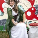 Everett Herald web producer Kate Erickson poses for a photo at the Washington Midsummer Renaissance Faire near Monroe on Sunday. (Annie Barker / The Herald)