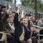 People cheer during the joust at the Washington Midsummer Renaissance Faire near Monroe on Sunday. (Annie Barker / The Herald)