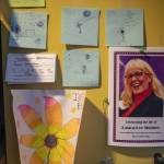Sticky notes with drawings to Curt Shriner from his late granddaughter Veronica Calhoun are on his office wall at the Historic Everett Theatre in Everett on July 24, 2024. (Annie Barker / The Herald)