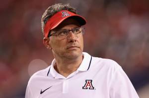 Jedd Fisch, then-coach of the Arizona Wildcats, walks the sidelines during the second half against the Washington Huskies at Arizona Stadium on Sept. 30, 2023, in Tucson, Arizona. (Christian Petersen / Getty Images)
