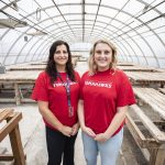 Marysville Pilchuck teachers Kayla Carter, left, and Claire Luvera, right, inside the decluttered greenhouse at Marysville Pilchuck High School on Monday in Marysville. (Olivia Vanni / The Herald)