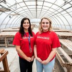 Marysville Pilchuck teachers Kayla Carter, left, and Claire Luvera, right, inside the decluttered greenhouse at Marysville Pilchuck High School on Monday, July 29, 2024 in Marysville, Washington. (Olivia Vanni / The Herald)
