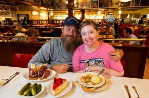Nathan and Kim Maker, scuba divers who had been lost in the Gulf of Mexico for nearly two days, at Kenny & Ziggys Delicatessen Restaurant & Bakery on Monday in Houston. The pair of scuba divers were dramatically rescued from the Gulf of Mexico  they knew their first stop after the ordeal would be Kenny & Ziggys. (Annie Mulligan / © 2024 The New York Times Company)
